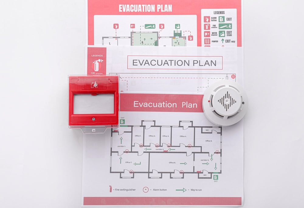 Essential fire safety equipment and evacuation plans for emergency preparedness.
