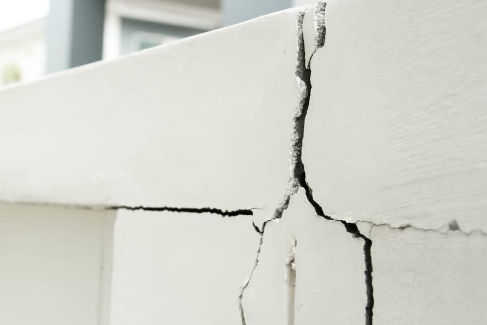 Cracks in the façade reveal the passage of time and the need for repair.