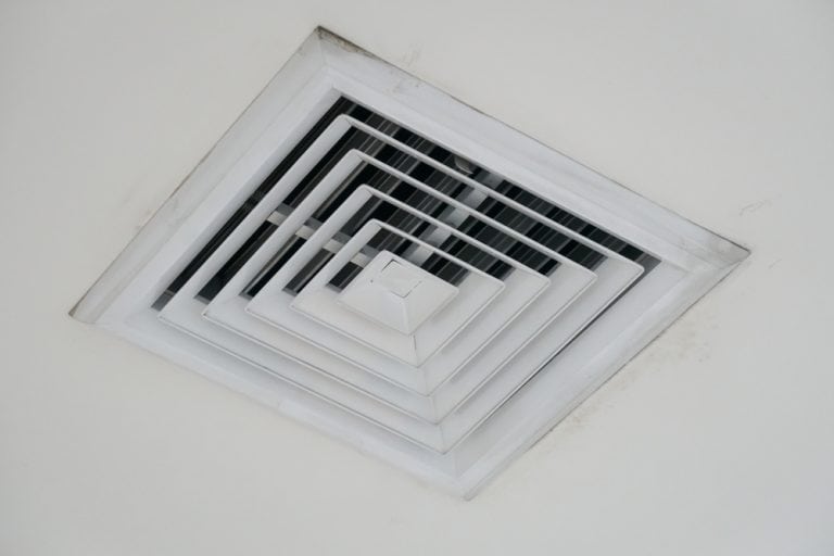 A close-up of a ceiling air vent.