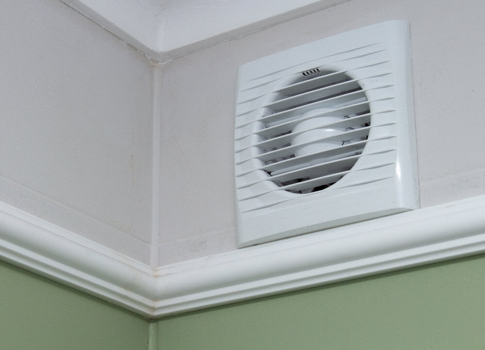 Wall-mounted bathroom exhaust fan ensuring proper ventilation.