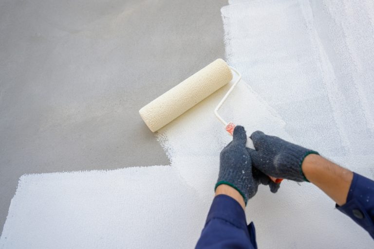 Painting a fresh start with a roller brush.