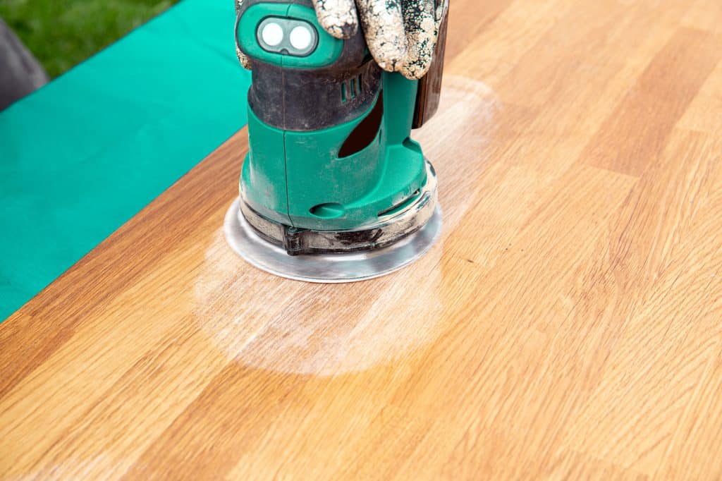 Smoothing the way—precision sanding for a flawless wooden finish!