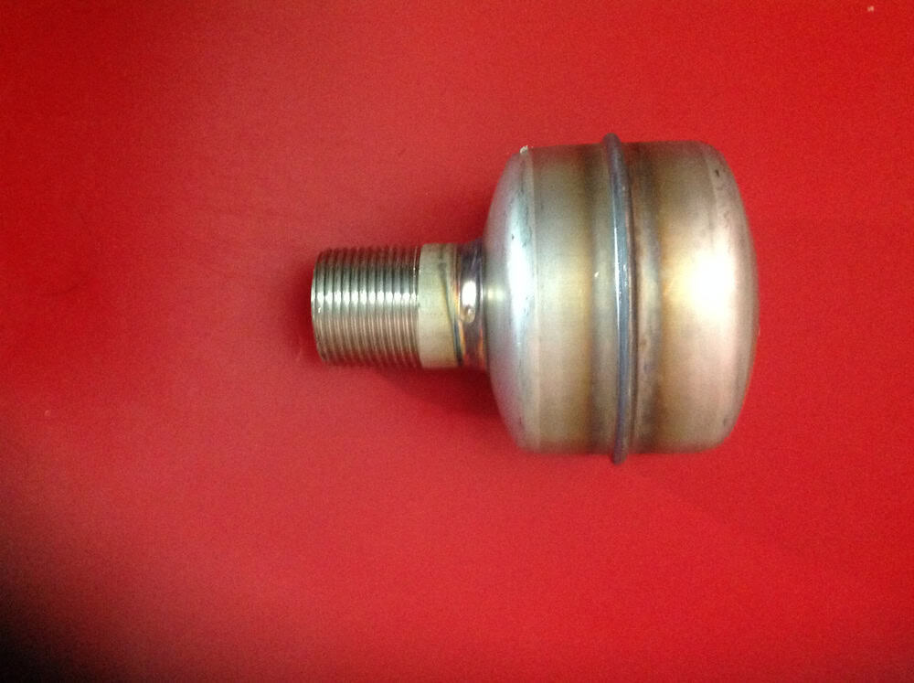 A metallic valve component against a vibrant red background.