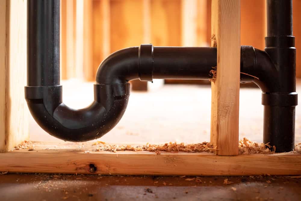 Close-up of a newly installed P-trap pipe.