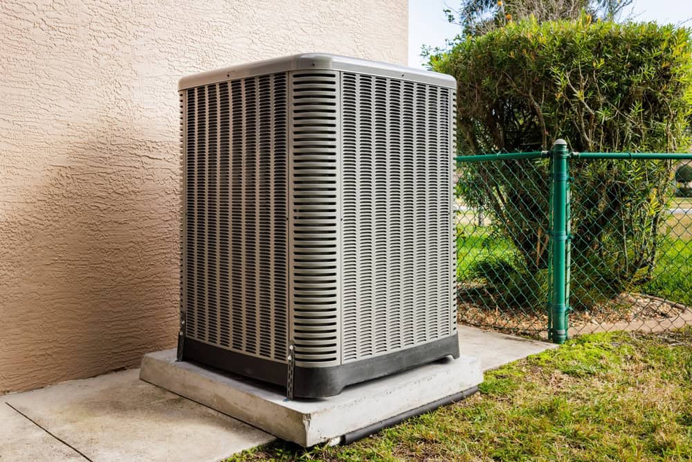 An air conditioning unit stands ready against the summer heat.