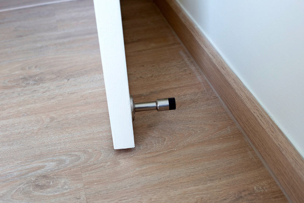 Doorstop detail: preventing damage, one swing at a time.