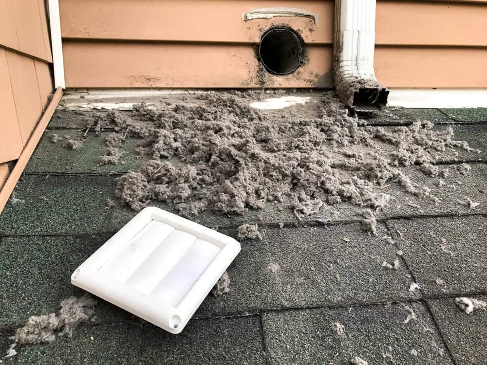 Dryer vent cleaning reveals massive lint buildup on roof - a sobering reminder of this common fire hazard.