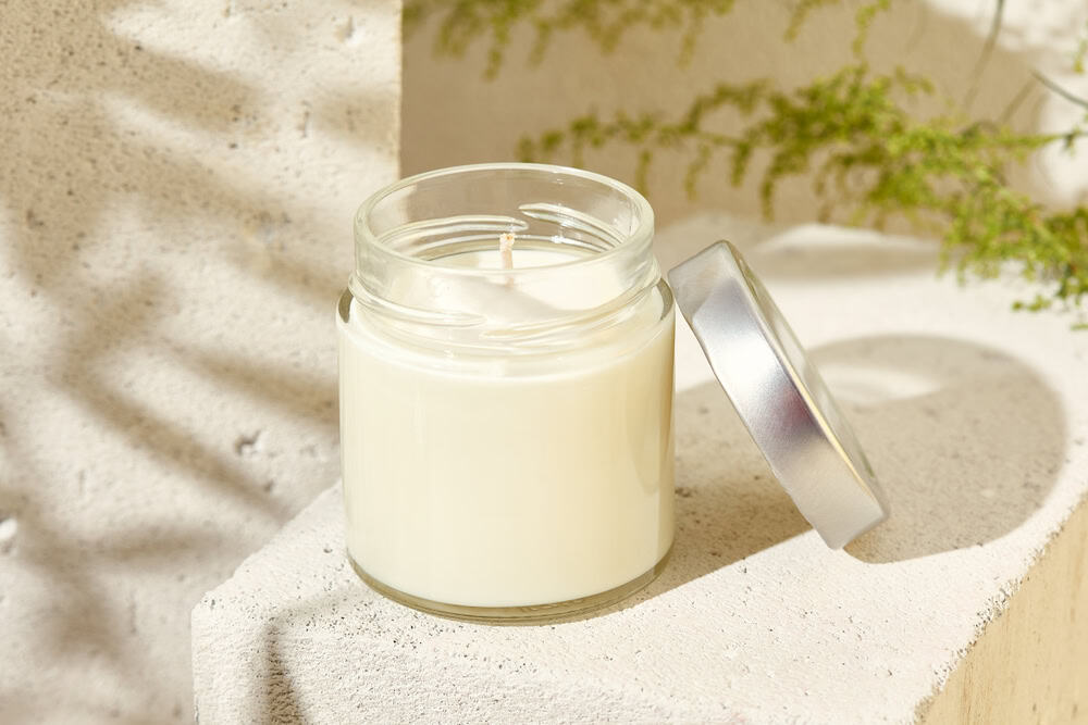 A serene moment captured with a softly lit candle.