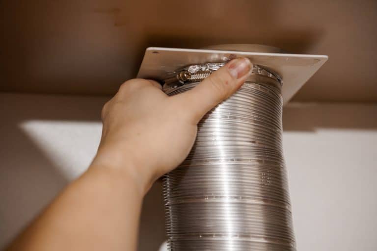 Installing a flexible duct for improved ventilation.