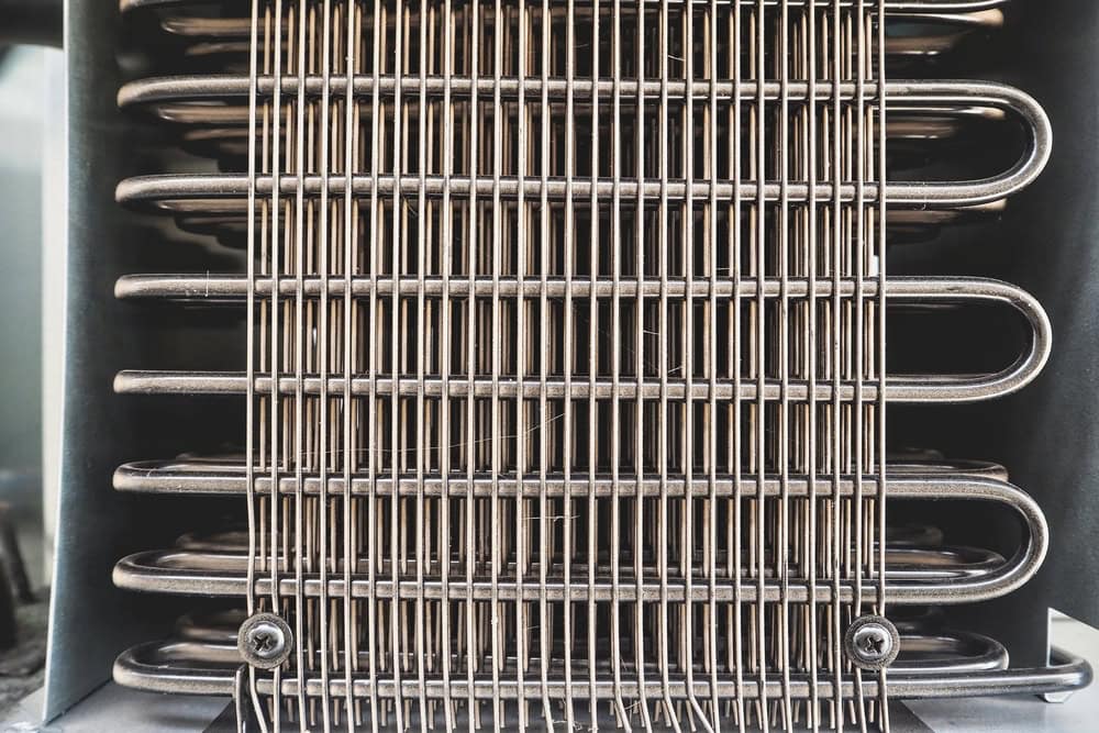 Close-up of a refrigerator's cooling coils.