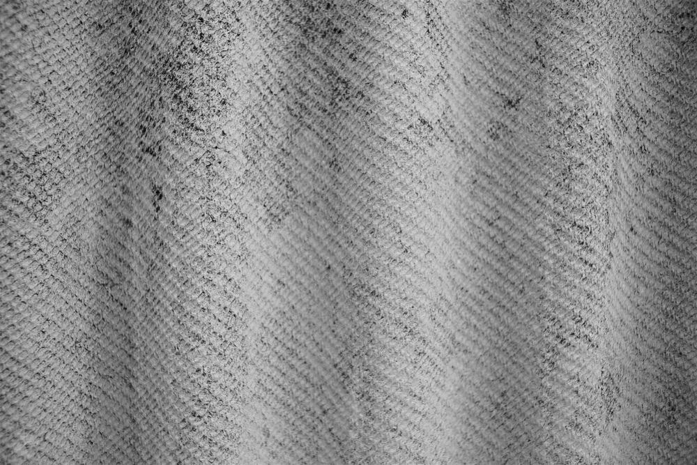 The texture of aged concrete.