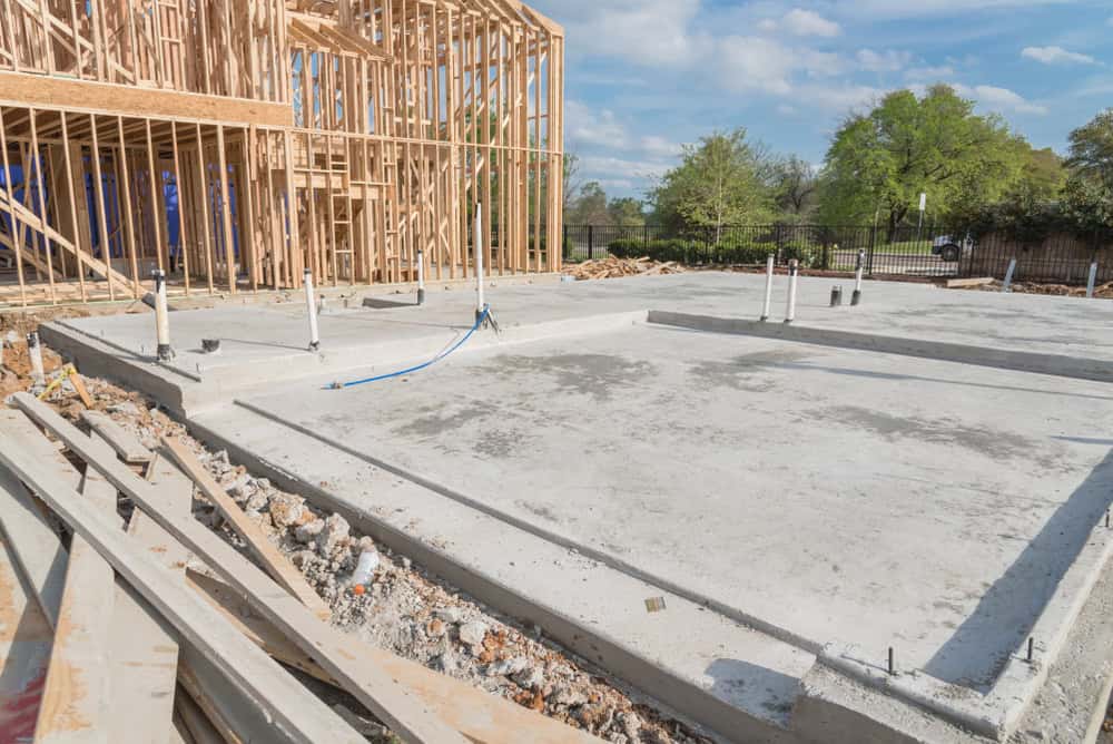 A new home takes shape as the foundation is poured.