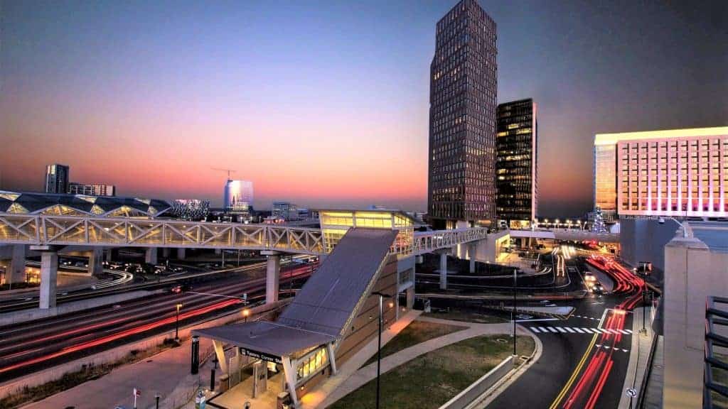 Tysons Corner Station at sunset: a vibrant blend of modern architecture and urban transit.