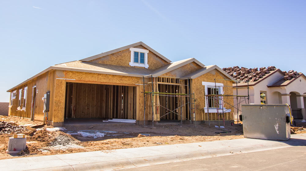A new home under construction, showcasing the framework and potential of modern suburban living.