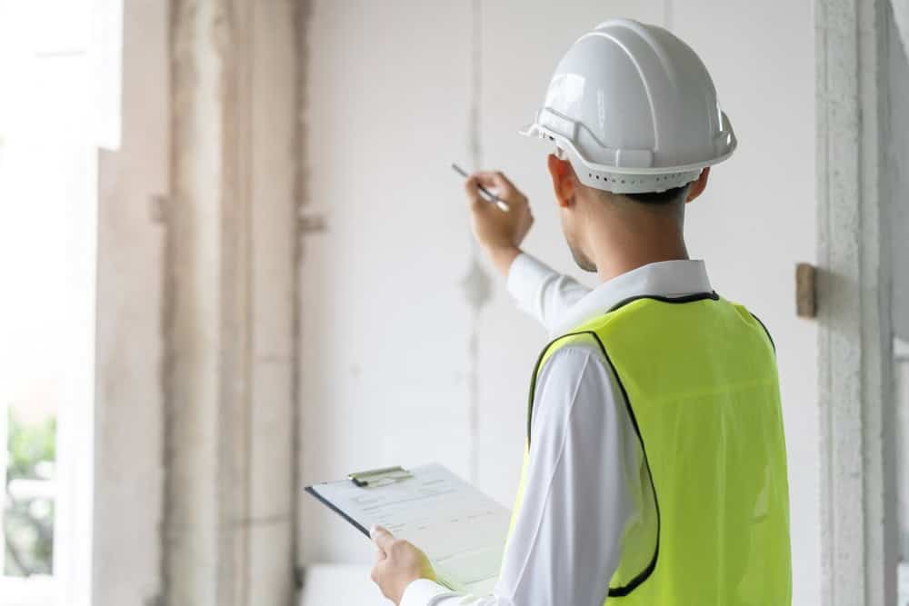 Thorough inspection in progress—building safety starts with attention to detail!