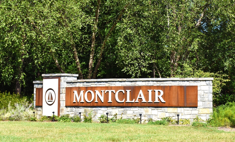 Welcome to Montclair - Wooden Sign Surrounded by Lush Green Trees