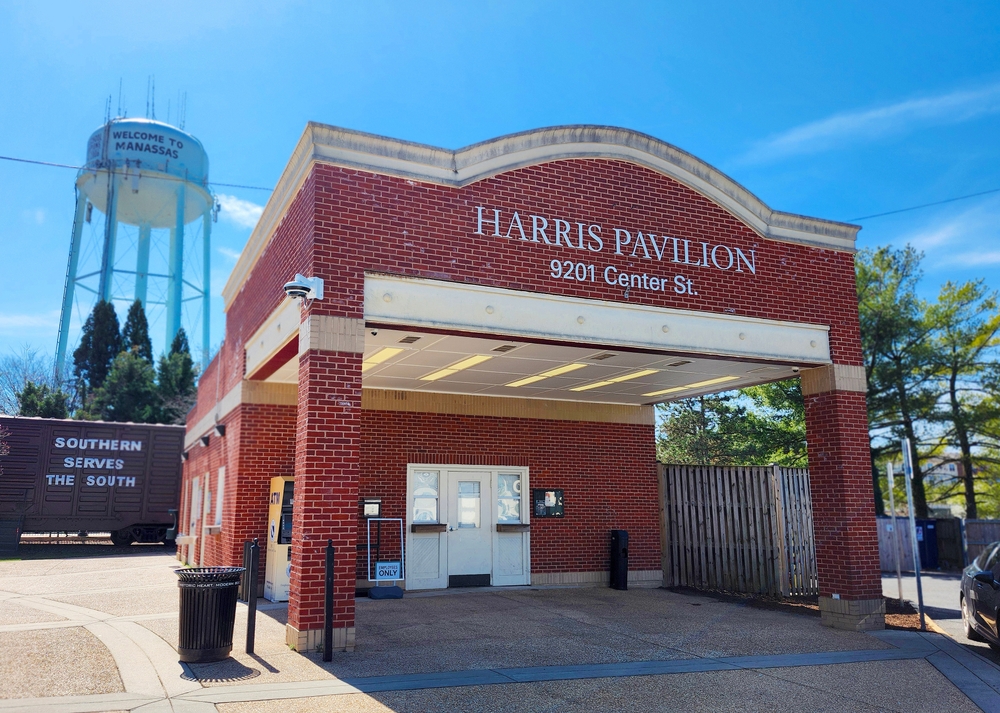 Harris Pavilion in the heart of Manassas welcomes visitors with its historic charm and the iconic water tower standing tall in the background.