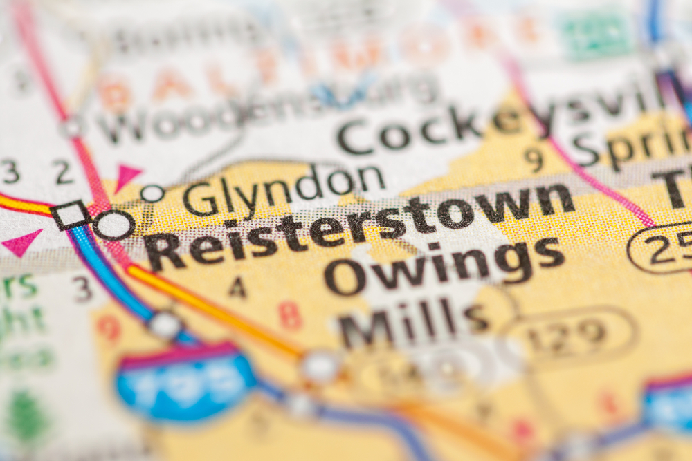 Reisterstown, Maryland on a map, highlighting the town's location northwest of Baltimore and Owings Mills.