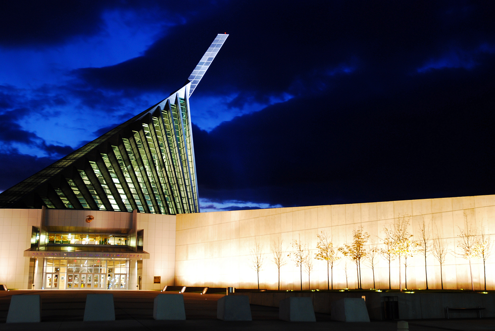 The striking architecture of the National Museum of the Marine Corps against a dramatic twilight sky.