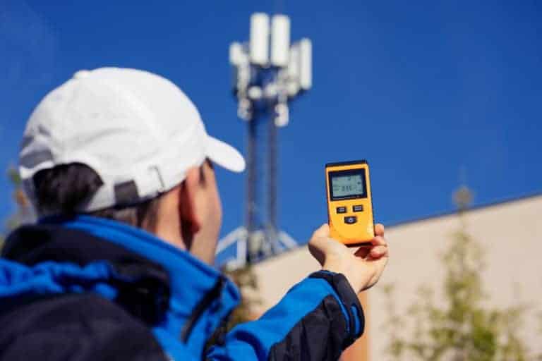 Measuring electromagnetic radiation near a cell tower—technology meets safety.